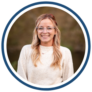 Mashayla Hanson, panelist for ASK an Expert webinar on navigating epilepsy Headshot of Mashayla Hanson, smiling, wearing glasses and a light-colored sweater.